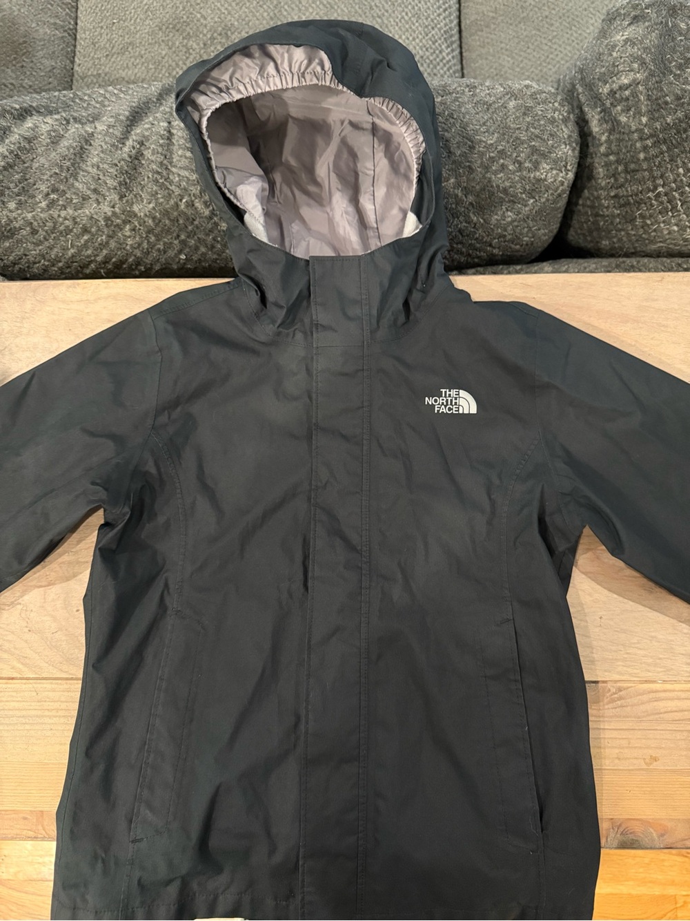 The North Face Kids Hooded Raincoat in Dark Gray with Light Gray Lining